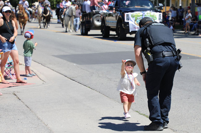 child with policeman