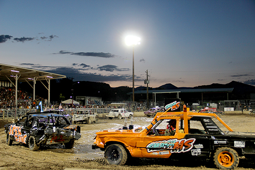 Demolition Derby cars in the arena of Garfield County Fairgrounds